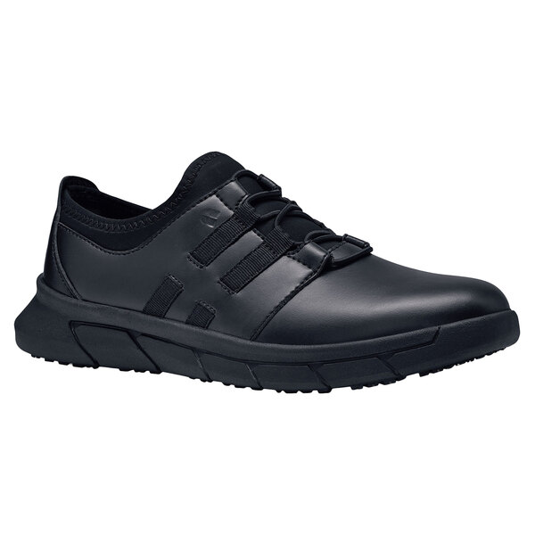 A black Shoes For Crews Karina athletic shoe for women with laces.