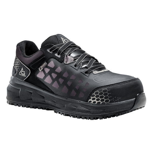 A black Aster women's work shoe with a mesh design.