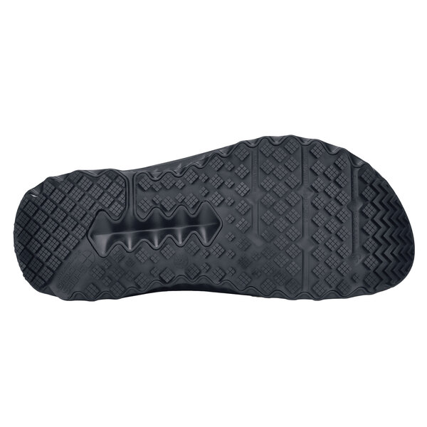 The black rubber sole of a Shoes For Crews Bloodstone men's shoe.