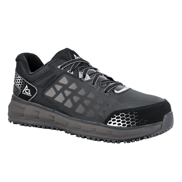 A black and grey ACE Aster women's safety shoe with black and white mesh.