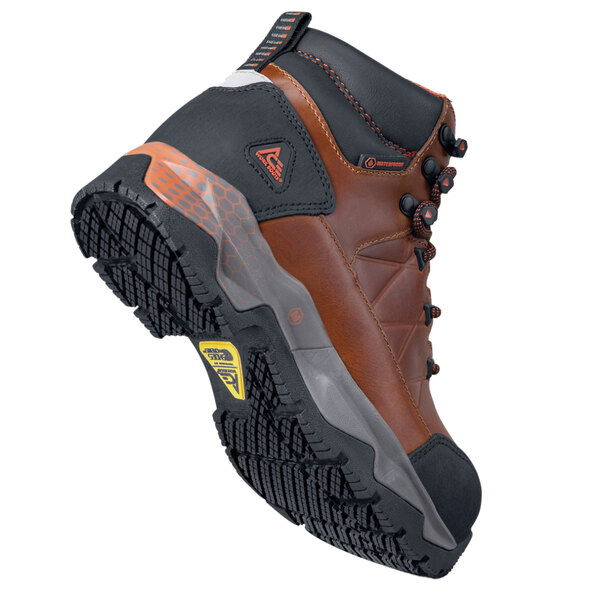 A brown leather ACE Highline women's work boot with a rubber sole.