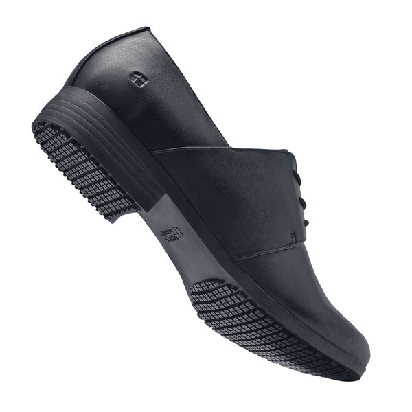 a black shoe with a sole