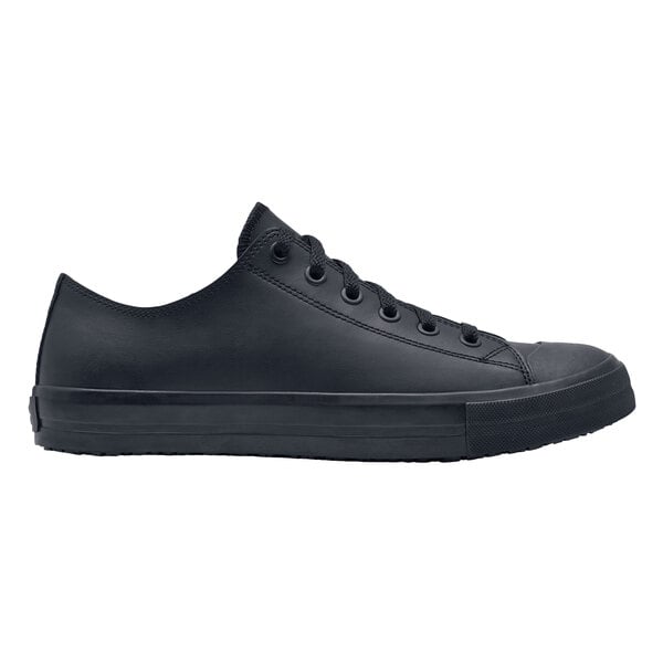 A black leather Shoes For Crews Delray sneaker with laces and a rubber sole.
