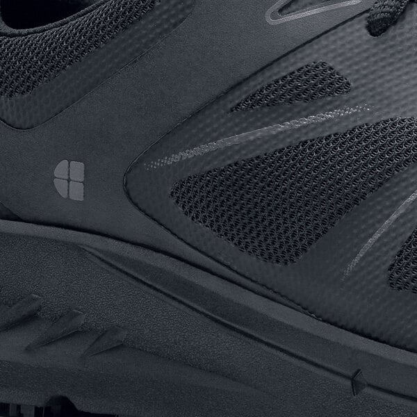 The back of a black Shoes For Crews Vitality II athletic shoe.