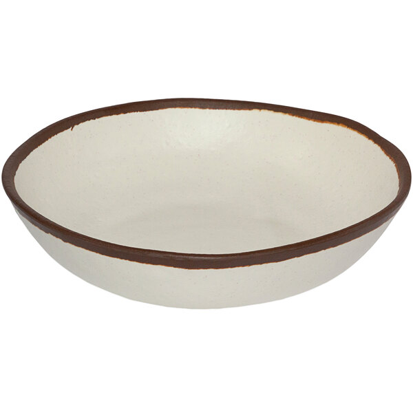 A white melamine salad bowl with brown trim.