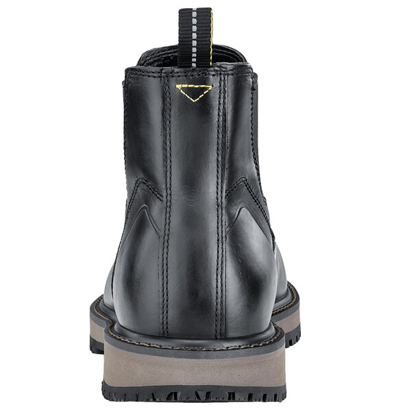 a close-up of a black boot