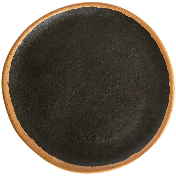 A black melamine plate with a brown rim.