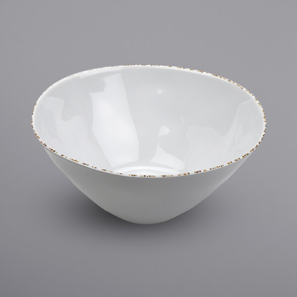 A white bowl with gold specks.