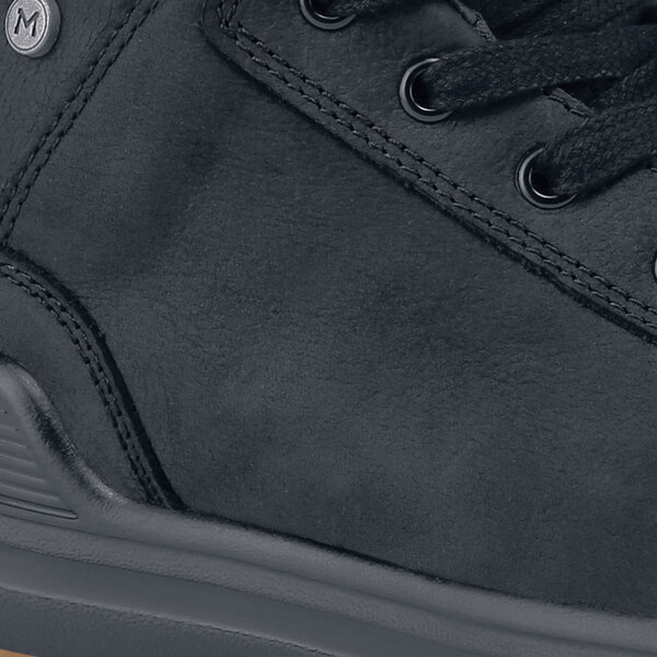 A black leather MOZO men's shoe with a rubber sole.