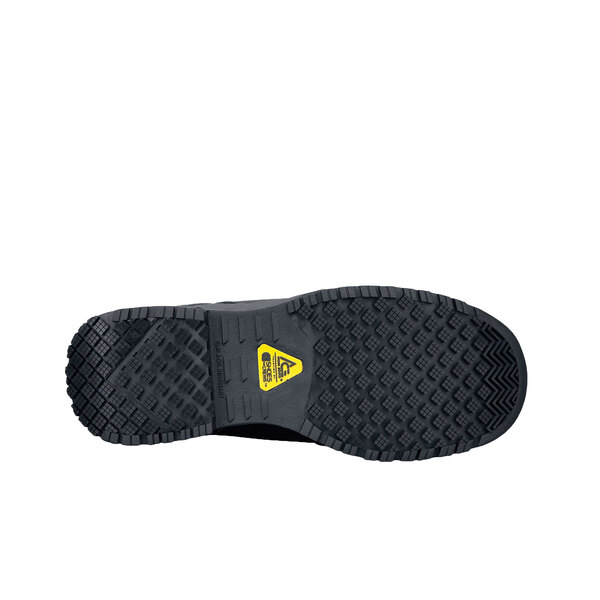 a black boot with a yellow logo