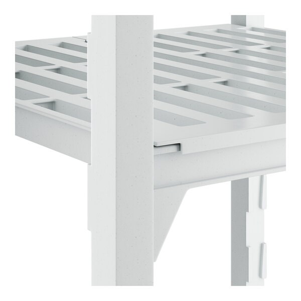 A white Camshelving® Premium shelving unit with vented shelves.