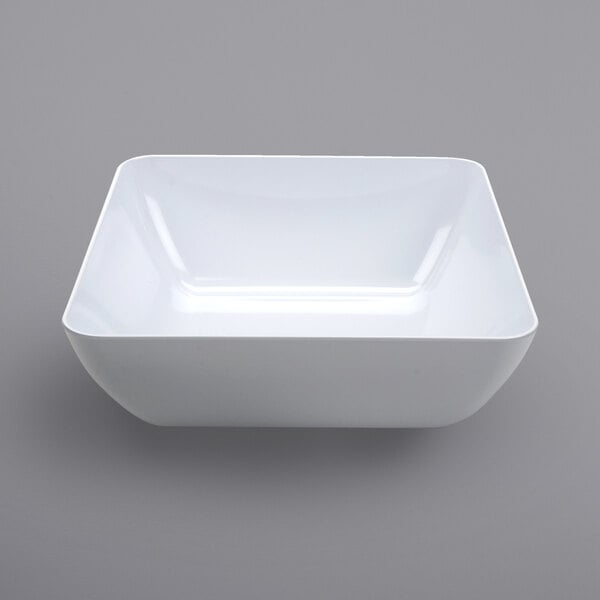 A white square bowl on a gray background.