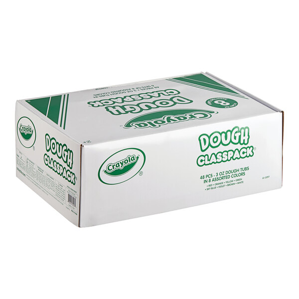 A white box of Crayola Modeling Dough with green text.