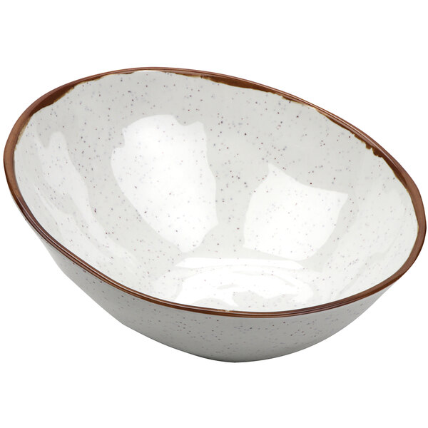 A white melamine bowl with a brown speckled rim.