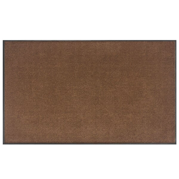 A light brown rectangular entrance mat with a black border.