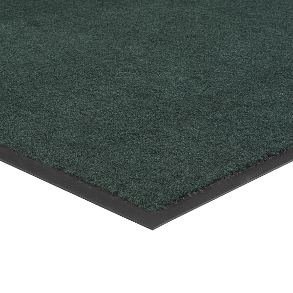 A green Lavex indoor entrance mat with black trim.