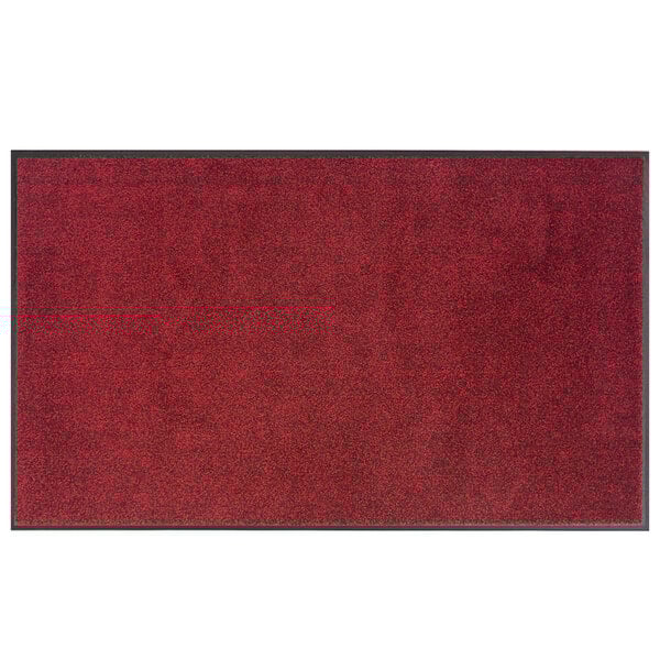 A red Lavex rubber-backed entrance mat with black specks.