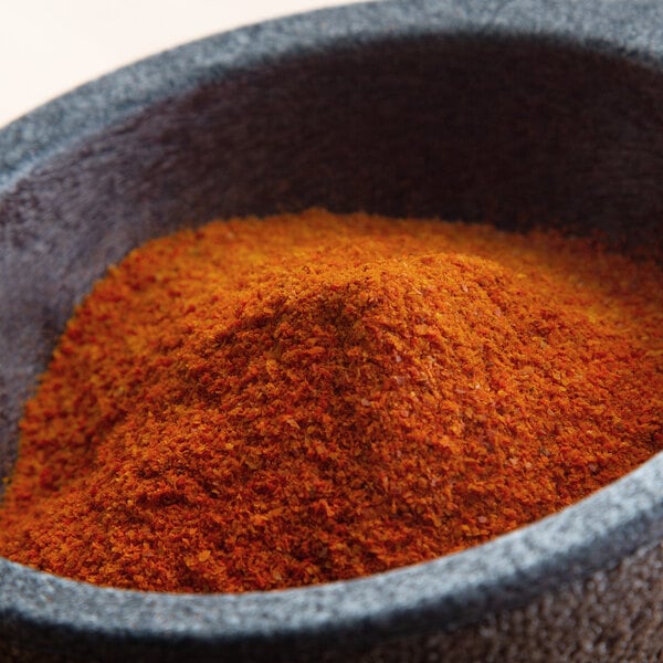 a bowl of red powder