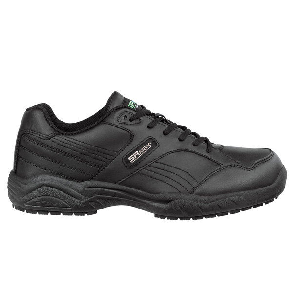 a black shoe with a white background