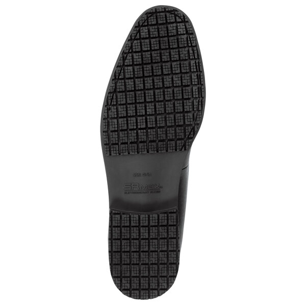 The black rubber sole of a SR Max men's penny loafer.