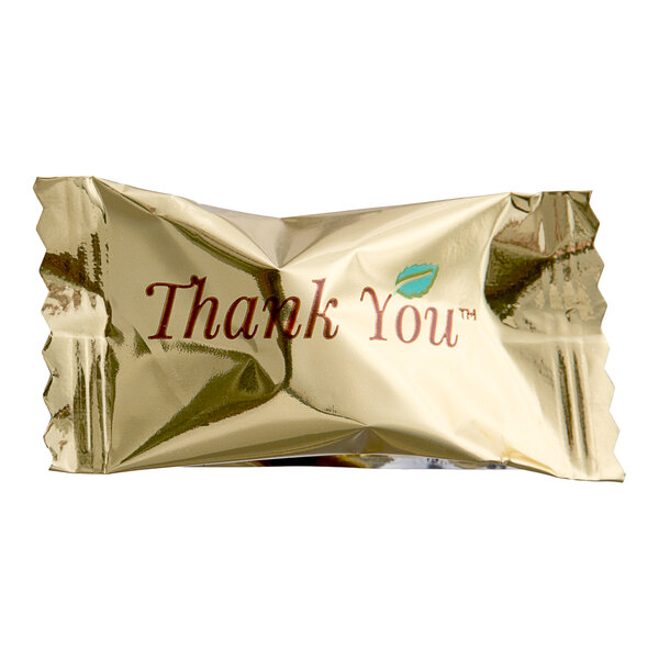 A close-up of a package of Thank You chocolate buttermints with gold foil wrappers.