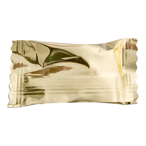 A shiny gold foil bag of "Thank You" individually wrapped chocolate buttermints.