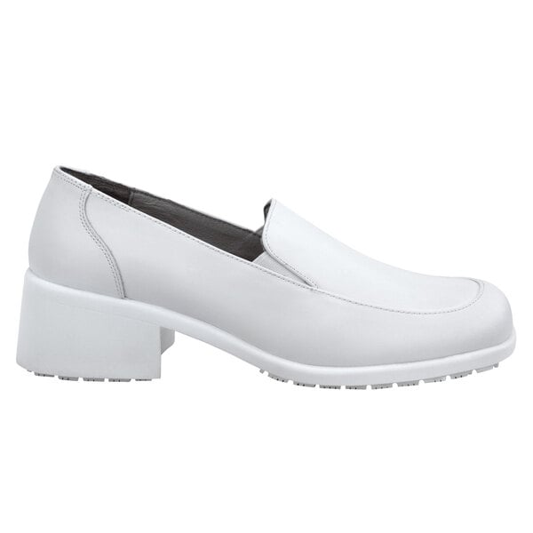 A white loafer shoe with a thick heel.