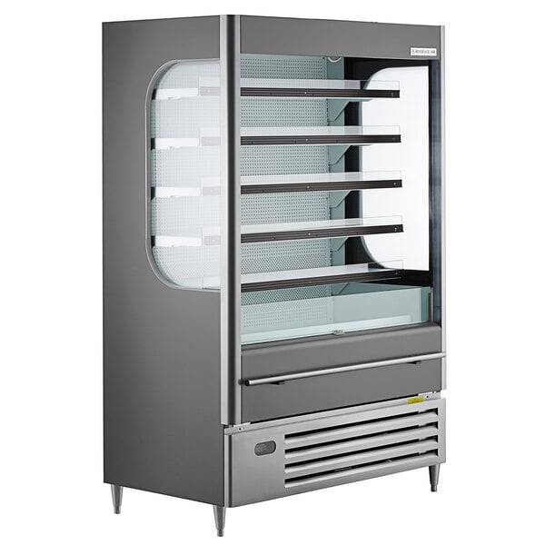 A Beverage-Air VueMax air curtain merchandiser with glass doors and shelves.