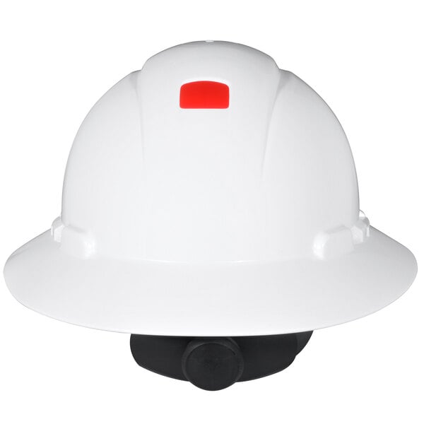 a white hard hat with a red square on the top