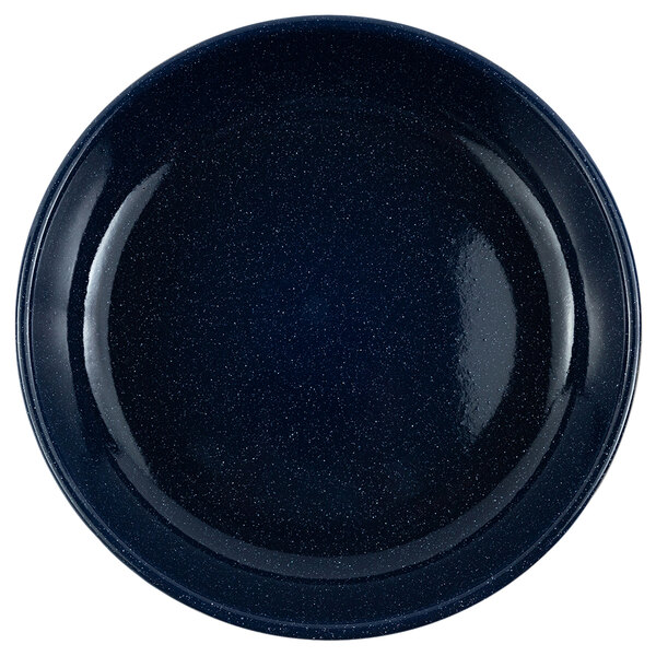 a blue plate with speckled surface