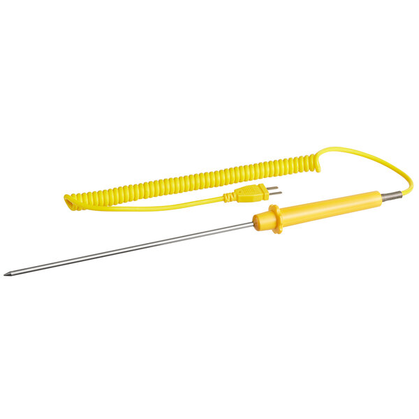 A Comark yellow thermometer probe with a coiled cable plugged into a counter.