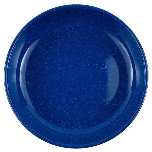 A medium blue Crow Canyon Home enamelware plate with white speckles.