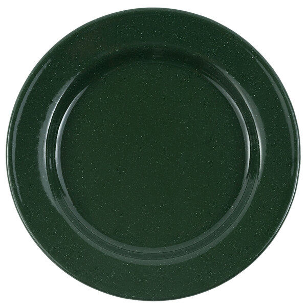 A Crow Canyon Home forest green enamelware plate with speckled surface and black rim.