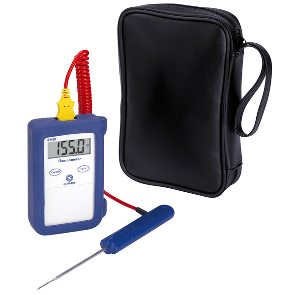 A Comark digital thermometer in a black case with a yellow and red handle.