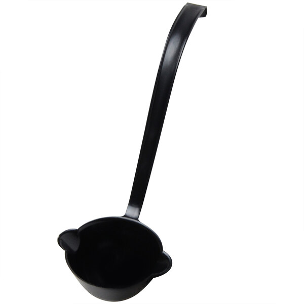 a black ladle with a long handle