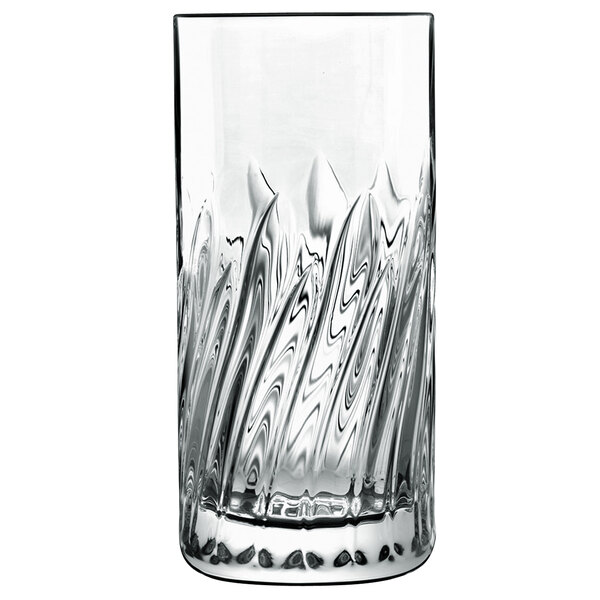 A close-up of a Luigi Bormioli shot glass with a swirl design.