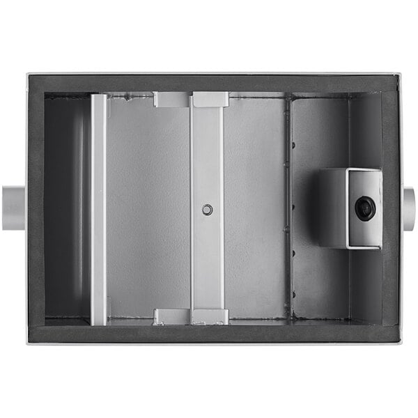 A metal box with a hole in it and a handle.