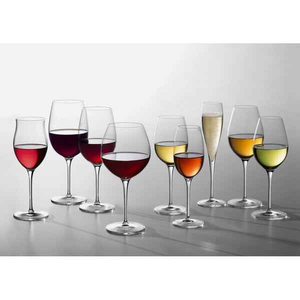 A group of Luigi Bormioli Riserva red wine glasses on a white background.
