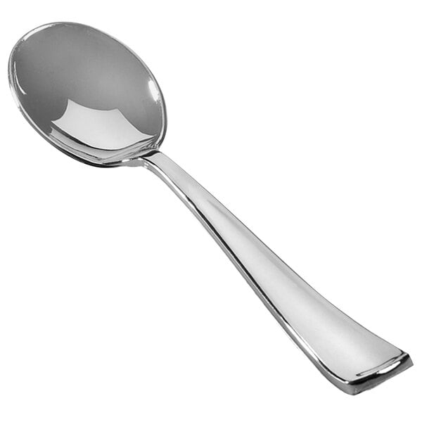 a silver spoon on a white background