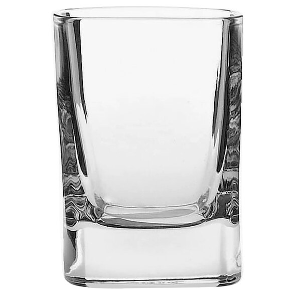 A clear Luigi Bormioli Strauss liqueur glass with a white background.