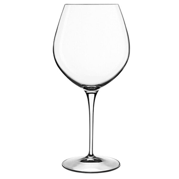 A close-up of a clear Luigi Bormioli Robusto red wine glass with a stem.