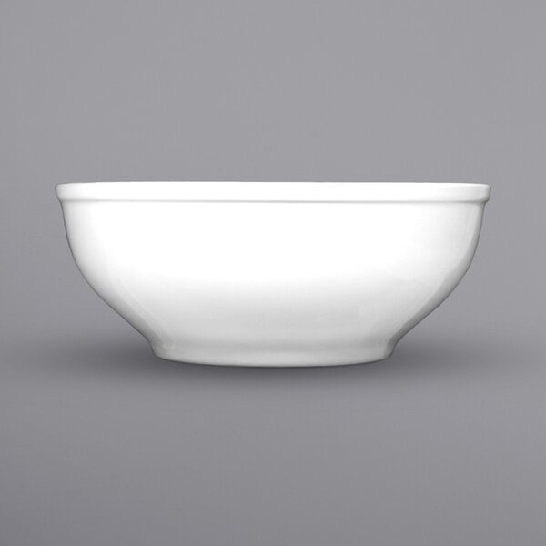 A white International Tableware Bristol china bowl with a rolled edge.