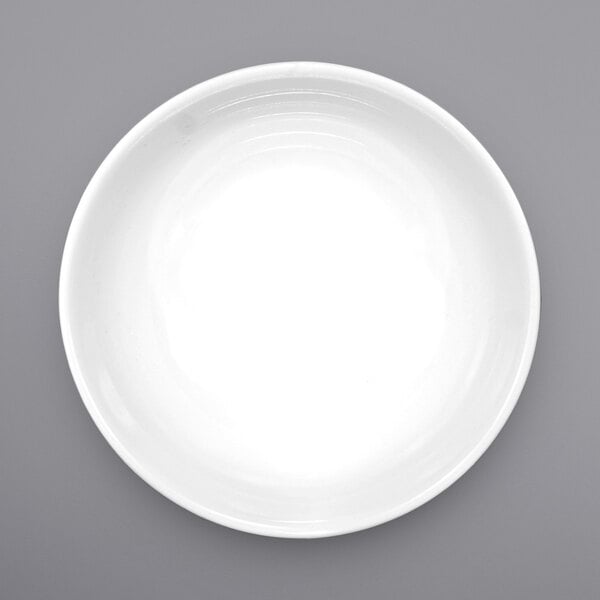 A white porcelain bowl with a rolled edge.