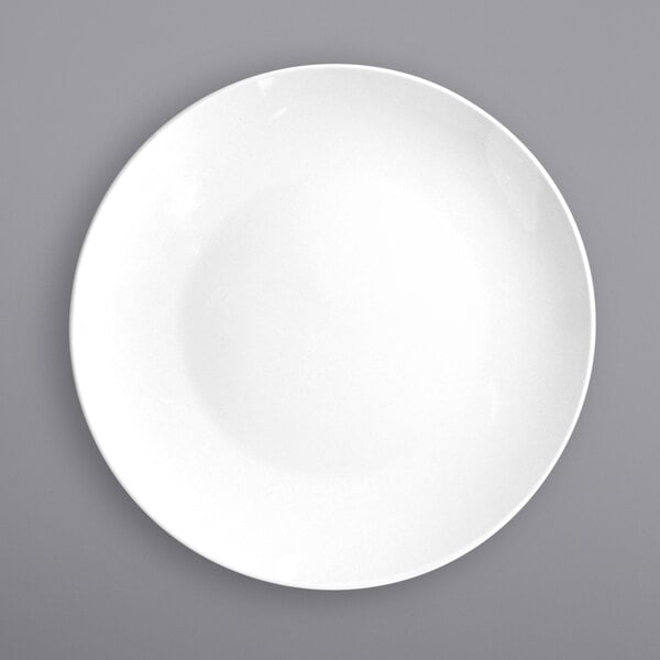 a white plate with a circle in the middle