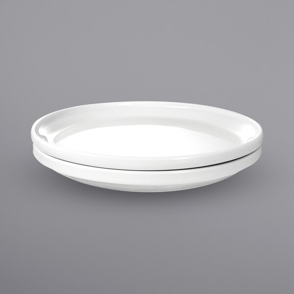 A white porcelain plate with a black rim.