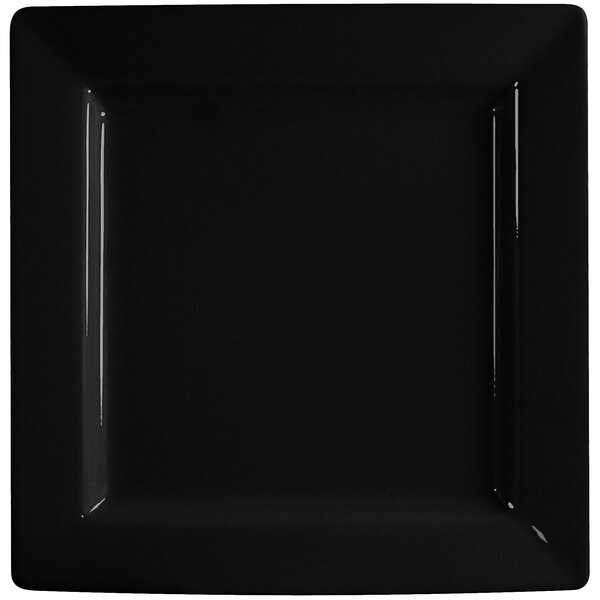 An International Tableware black square porcelain plate with a white rim.