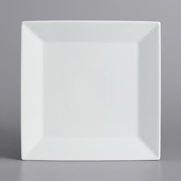 A white square plate on a gray background.