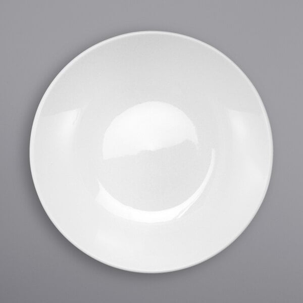 A white International Tableware Torino porcelain pasta plate.