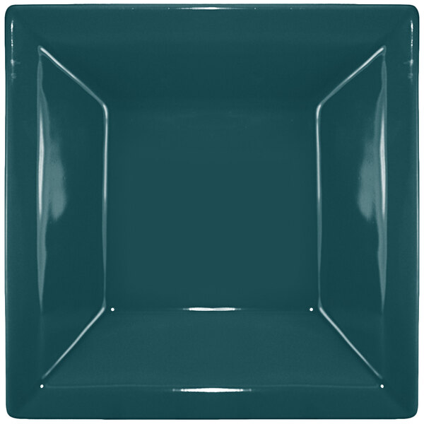 A square blue bowl with a white center.