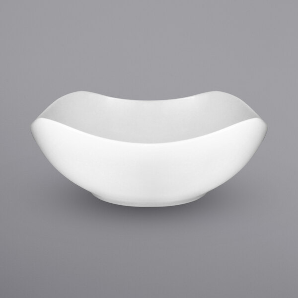 A white bowl with a curved edge.